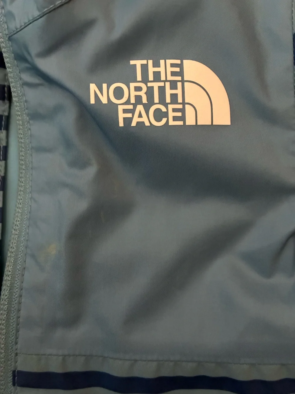 The North Face Infant ZIPLINE RAIN JACKET NIAGARA BLUE MINI STRIPE PRINT 6-12 mo